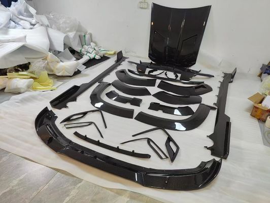 Per BMW XM Kit widebody in fibra di carbonio XM Upgrades stile RNG Fibra di carbonio diffusore della bocca anteriore ruota arco spoiler cappuccio corpo largo
